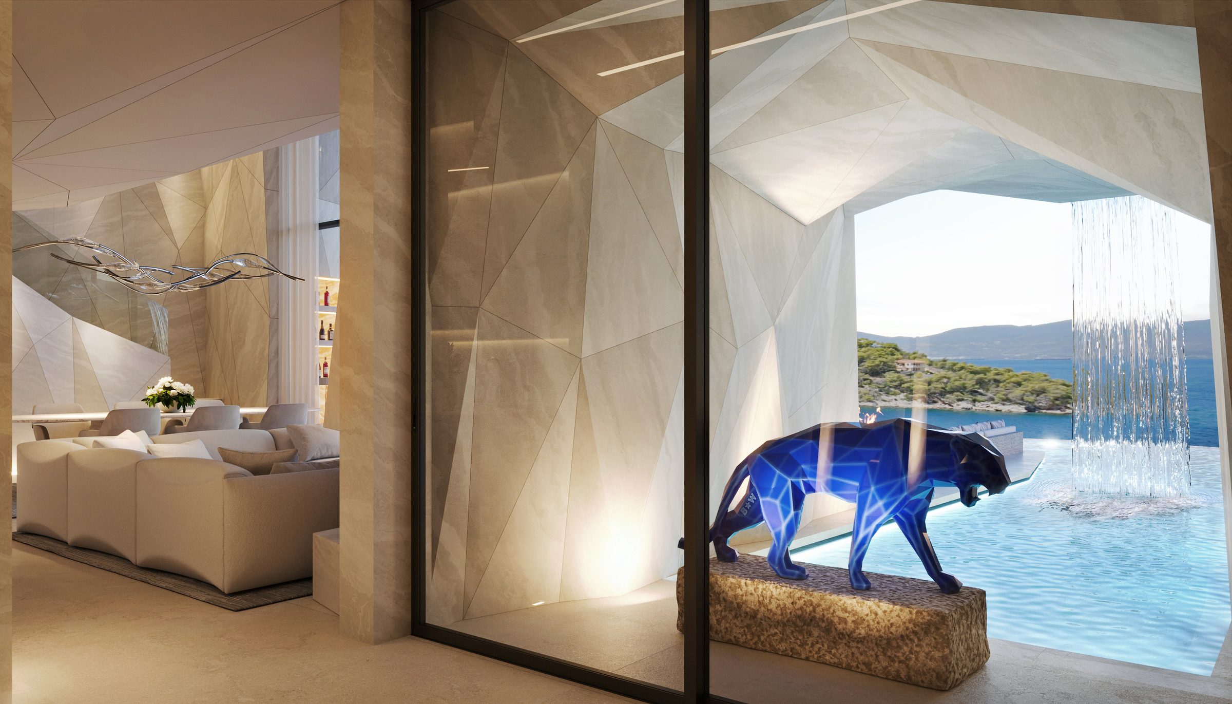 Living room of the Bay Amoni villa: faceted stone walls, Orlinski's blue panther in front of the infinity pool and the bay